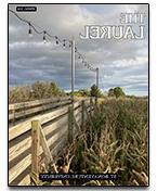 Cover image shows a wooden bridge near a corn field.